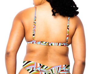 Model facing back wearing Ally Bikini Top in Prism