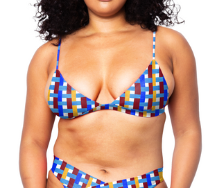 Model facing front wearing Ally Bikini Top in Azulejo