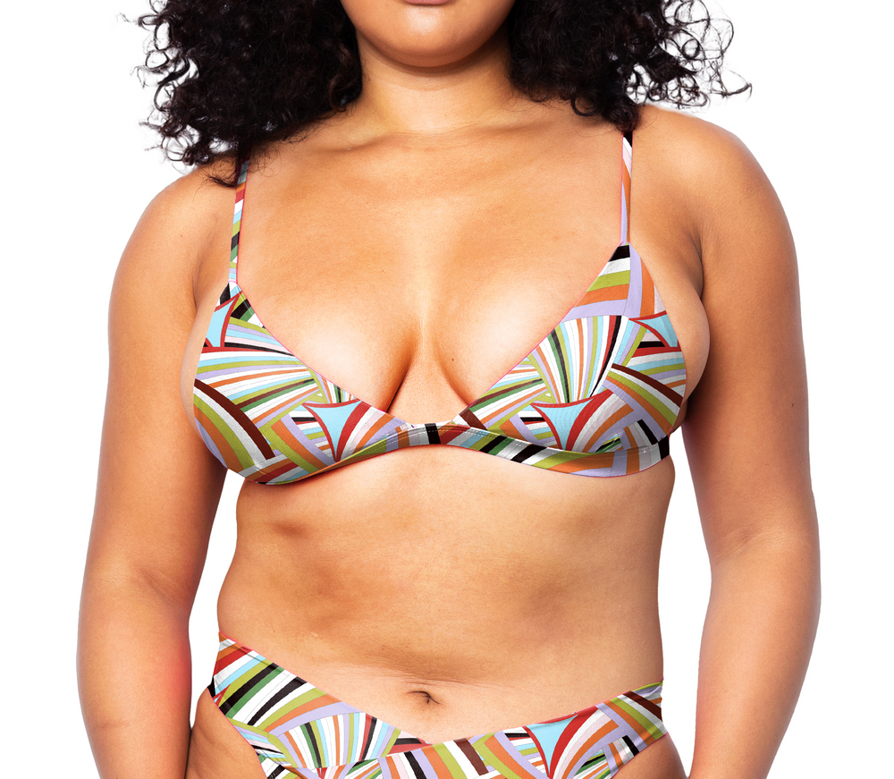 Model facing front wearing Ally Bikini Top in Prism