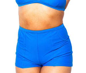 Model wearing MIGA Ally Boy Shorts in Cobalt Blue with matching MIGA Ally Bikini Top.