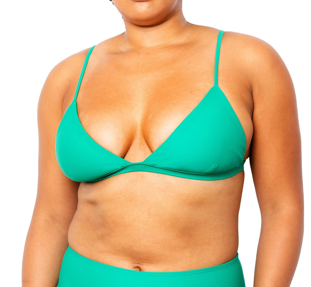 
            
                Load image into Gallery viewer, Model wearing MIGA Ally Bikini Top in Emerald Green with Adjustable Straps and matching MIGA Colette Bikini Bottom in Emerald Green. 
            
        