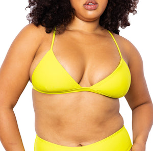 Model  wearing MIGA Ally Bikini Top in Lime Green with Adjustable Straps and Colette Bikini Bottom.
