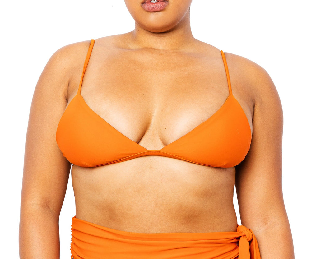 Model wearing MIGA Ally Bikini Top in Burnt Orange with Adjustable Straps and Lydia Bikini Bottom.