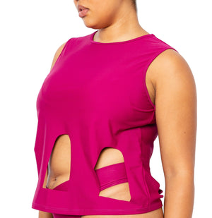 Model facing side wearing Marije Top in magenta. Also wearing matching magenta Ally Bikini Bottom with Crossover waistband.