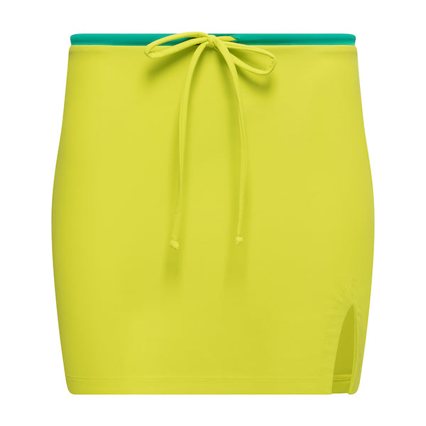 Mid-thigh swim skirt in lime green with adjustable emerald green waistband and small slit in left side.